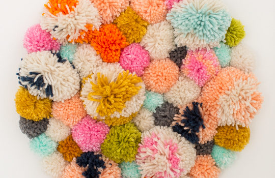 Decorazione sul muro di pompon